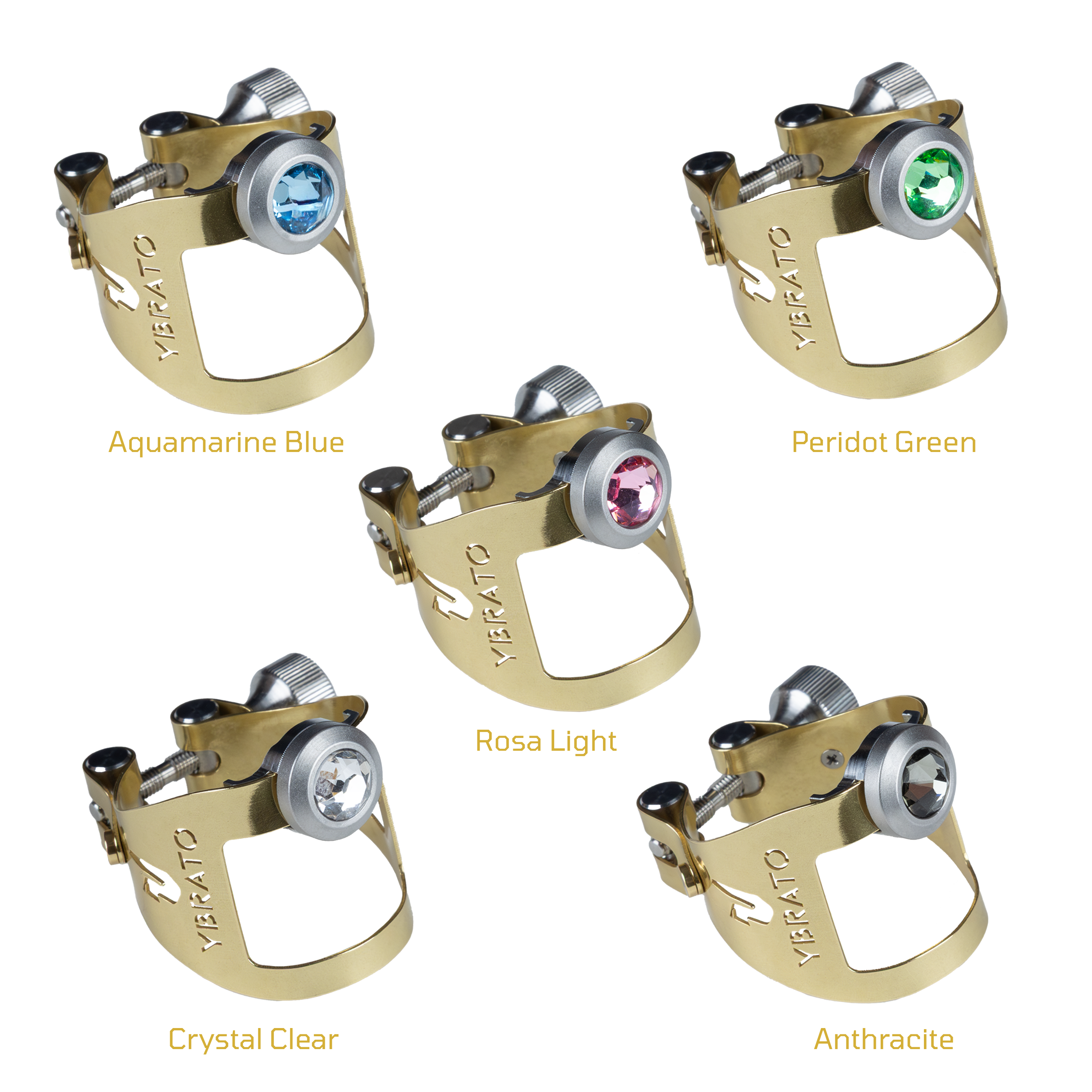 A product showcase of the Ybrato ReedReflector Crystal Edition featuring five gold-finished ligatures, each adorned with a different crystal color: Aquamarine Blue, Peridot Green, Rosa Light, Crystal Clear, and Anthracite